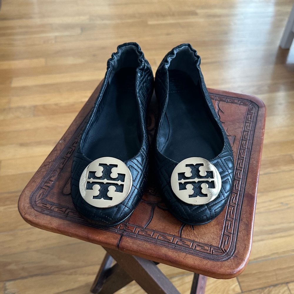 NWOT Tory Burch Black Flats with Gold Emblem